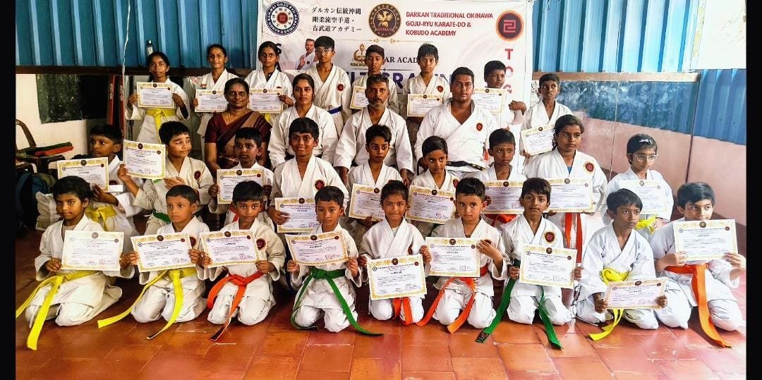 Darkan karate students and instructors holding certificates after completing the August 2026 belt grading at Star Academy Ayyapanthangal